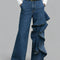 PANTALÓN VAQUERO WIDE LEG CON VOLANTE ASIMÉTRICO